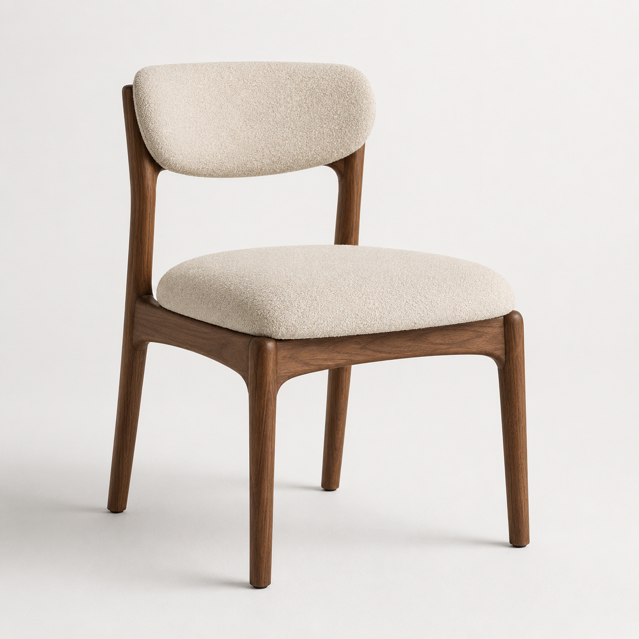 Luxury boucle dining chair with walnut wood frame